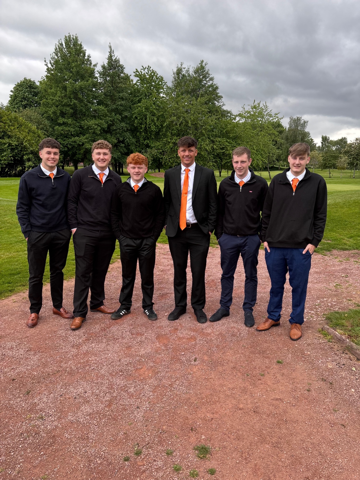 The six founding members of Burghill Rangers AFC in club colours